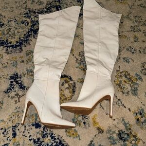 White heeled thigh high boots